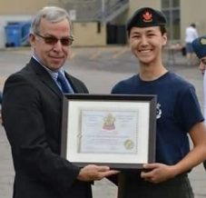 Cadet Corporal Carbert receiving her award